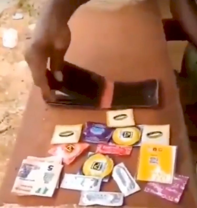 HILARIOUS MOMENT; A LOST BUT FOUND WALLET CONTAINS 12 CONDOMS AND #5