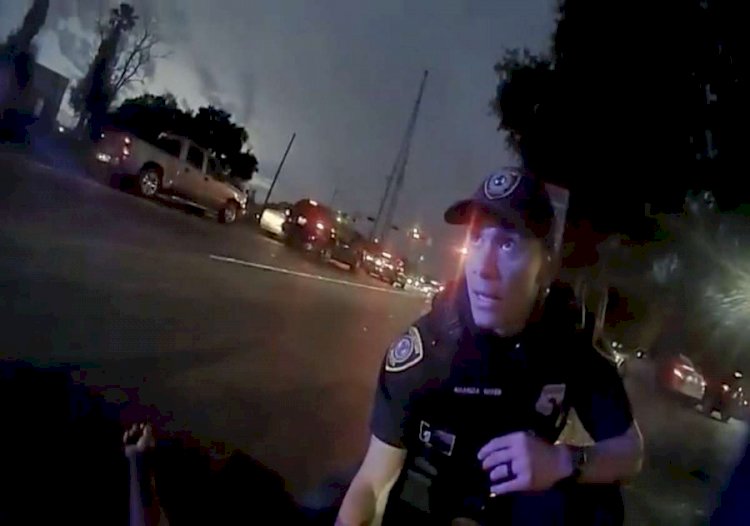 BODY CAM GIVE AWAY A POLICE OFFICER DRIVING WITH ONE HAND  IN HOUSTON